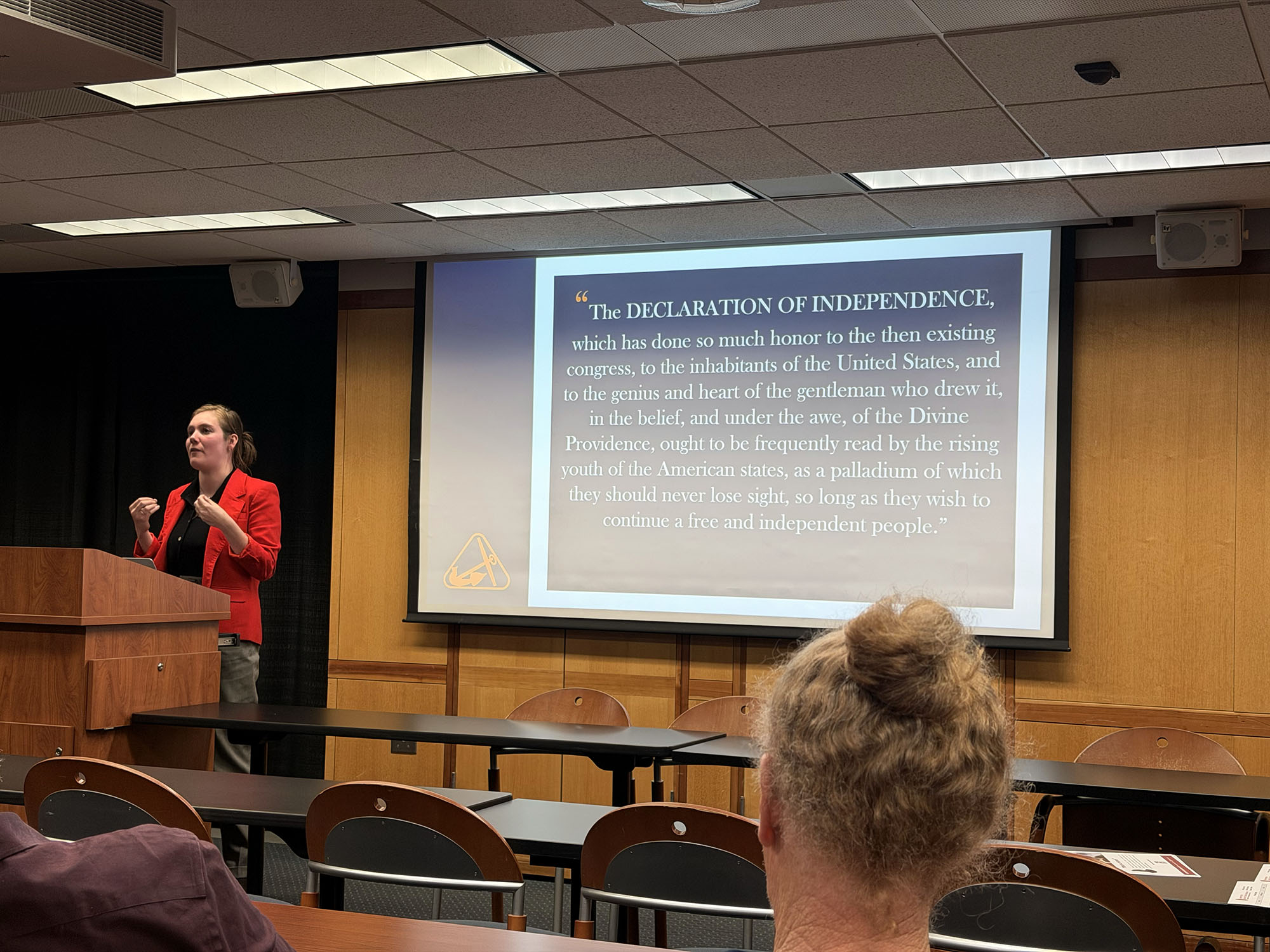 Slide photographed 24:23 into the lecture